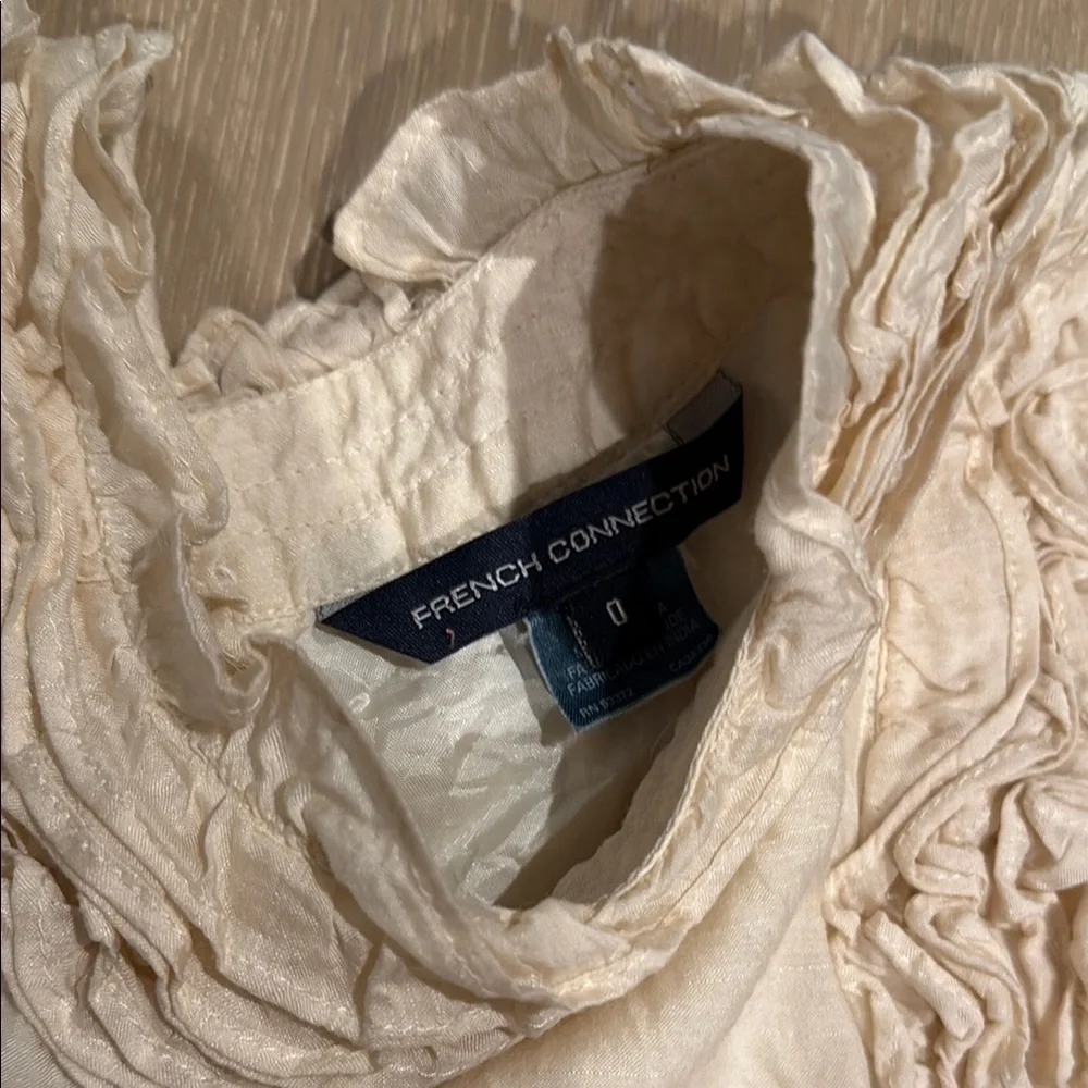 Cream Sleeveless Ruffled Top - Picture 2 of 4